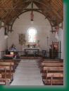 L'intrieur rnov de la chapelle avec les vitraux et les statues des sept fondateurs de la Bretagne chrtienne